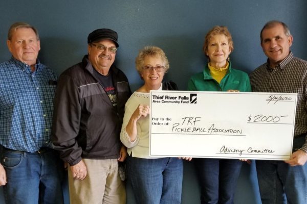 (From L to R)- Ole Tweet (TRFACF), Jim Strandlie (TRFACF), Jan Strandlie (TRFACF), Edie Brandli,
